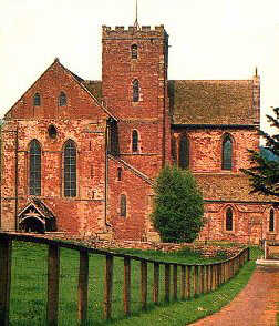 Dore Abbey shows the red colour of one of the masonry stones and stone slates of the region.